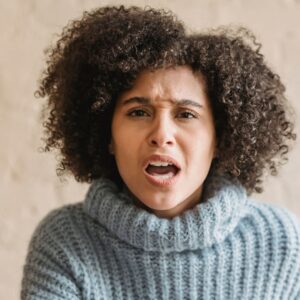 Angry woman experiencing grief. 