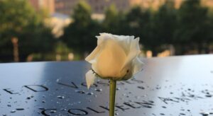 Gravestone with a flower.